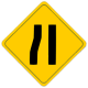 Left lane ends ahead.